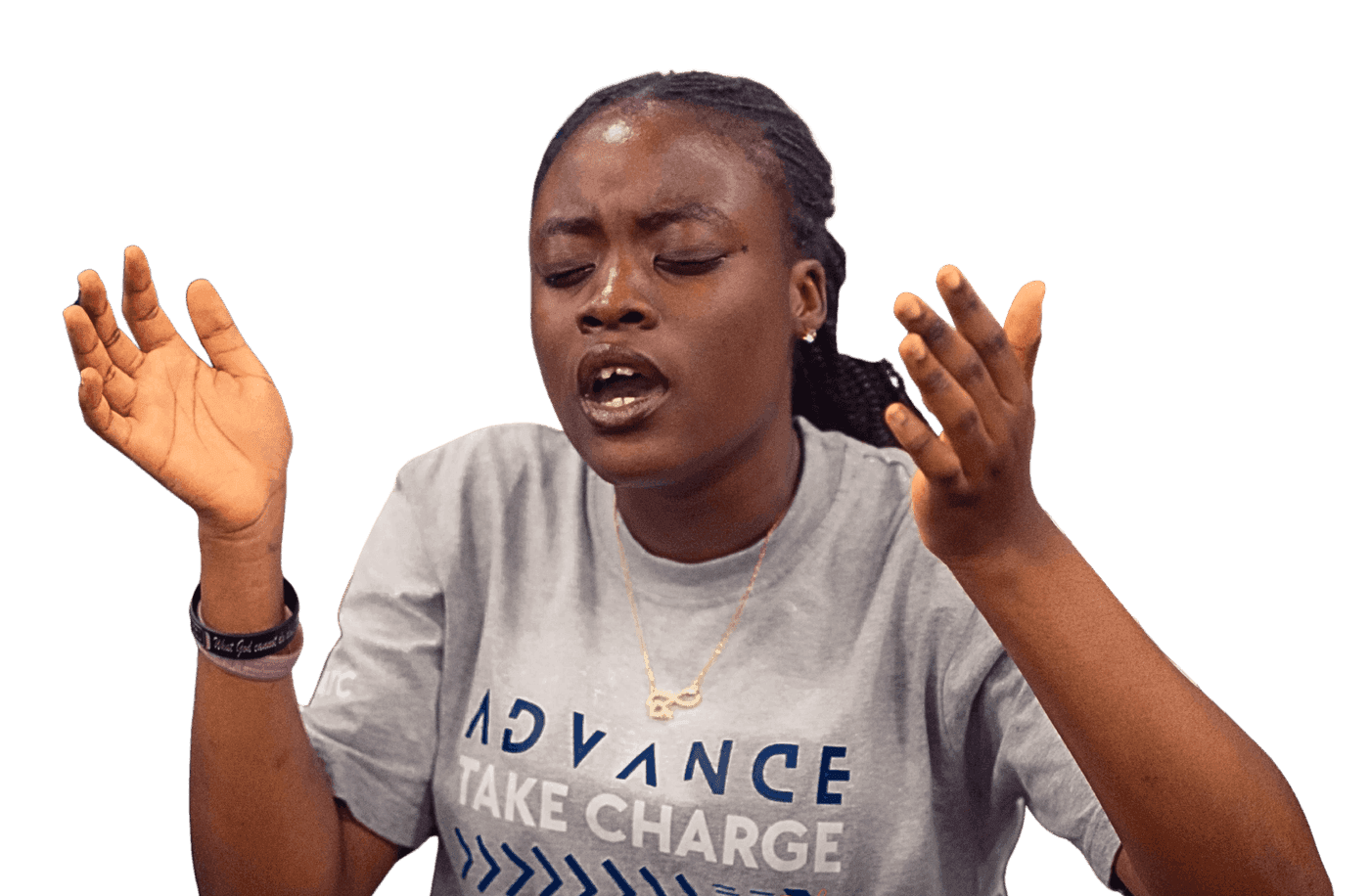 A student in worship during morning devotion