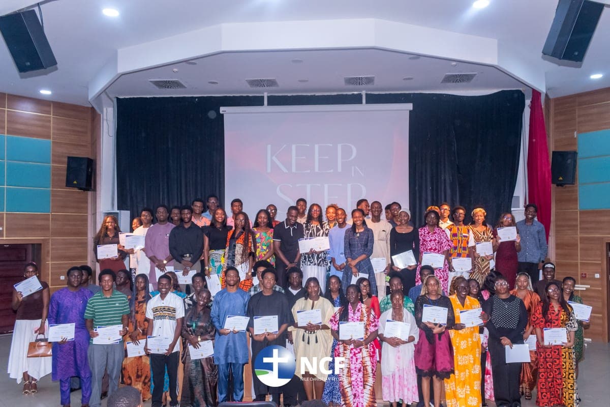 Students receiving certificates at a Discipleship School graduation