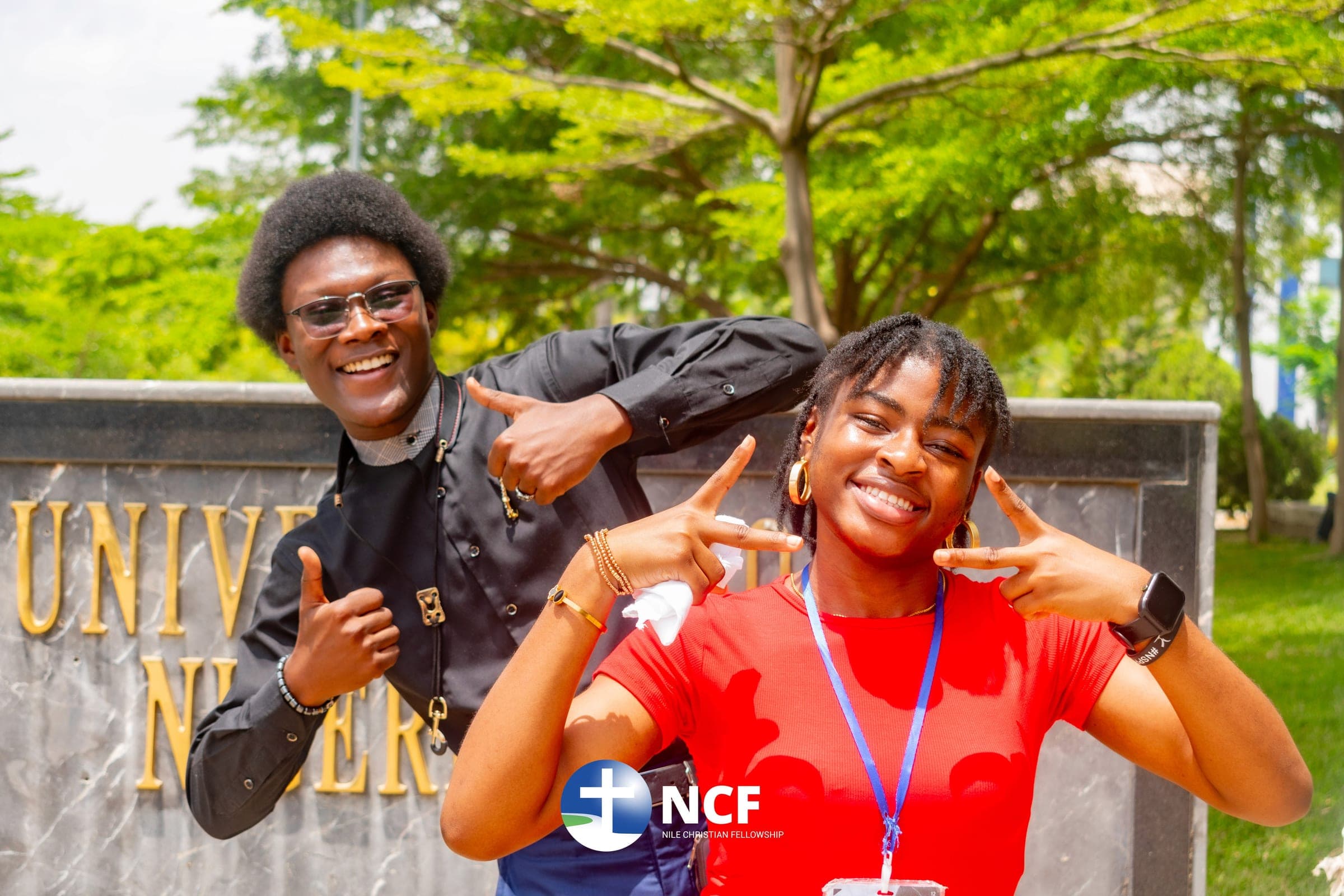 Two students laughing together on the Nile University campus